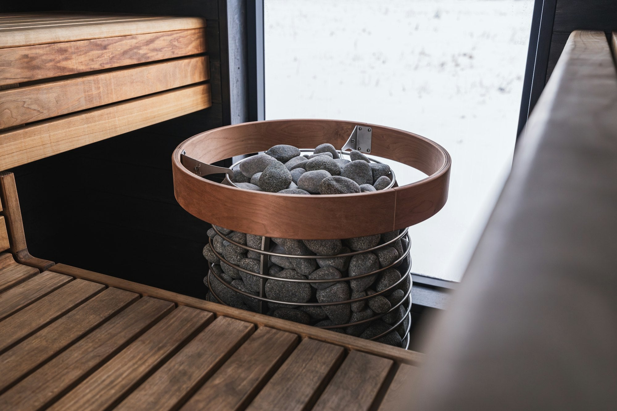 Sauna heater filled with hot stones